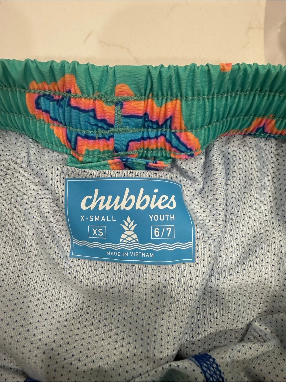 chubbies Teal Swim Trunks with Pink & Blue Shark Print